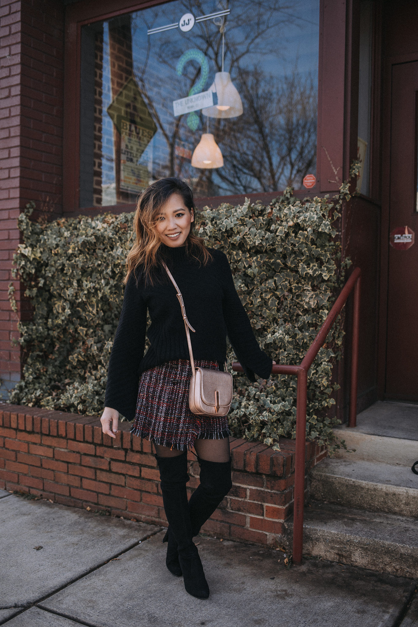 Your Ultimate Guide to Blogging 2018 Edition - Chic Winter Outfit in a turtleneck sweater, mini skirt, and stuart weitzman boots | le-jolie.com | Black top coat, feminine style, winter fashion, winter outfits, winter look, tweed skirt, tweed mini, bershka, karen walker, metallic trend, metallic handbag, over the knee boots, otk boots, minimal style, asian blogger, influencer style, turtleneck sweater outfit, black turtleneck