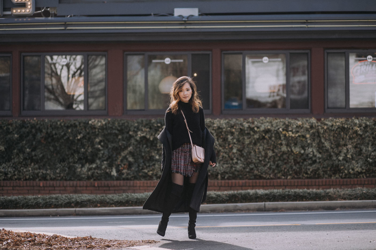 Your Ultimate Guide to Blogging 2018 Edition - Chic Winter Outfit in a turtleneck sweater, mini skirt, and stuart weitzman boots | le-jolie.com | Black top coat, feminine style, winter fashion, winter outfits, winter look, tweed skirt, tweed mini, bershka, karen walker, metallic trend, metallic handbag, over the knee boots, otk boots, minimal style, asian blogger, influencer style, turtleneck sweater outfit, black turtleneck